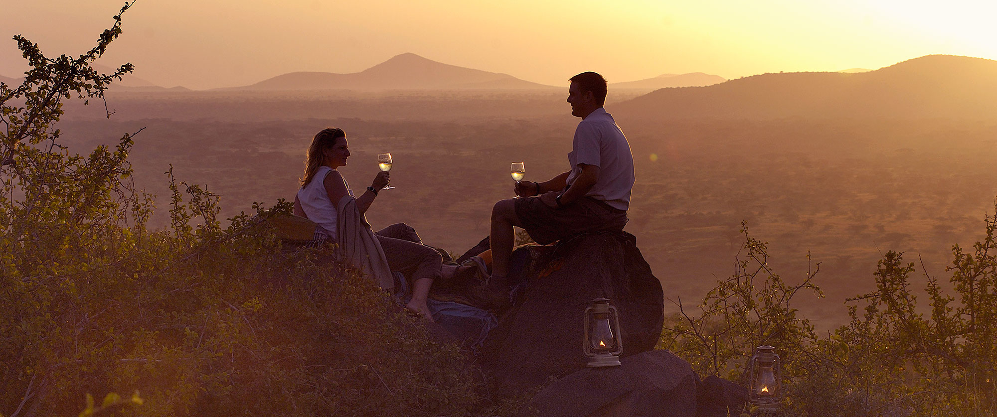 Romantic safari sundowner at Joys Camp during African honeymoon safari
