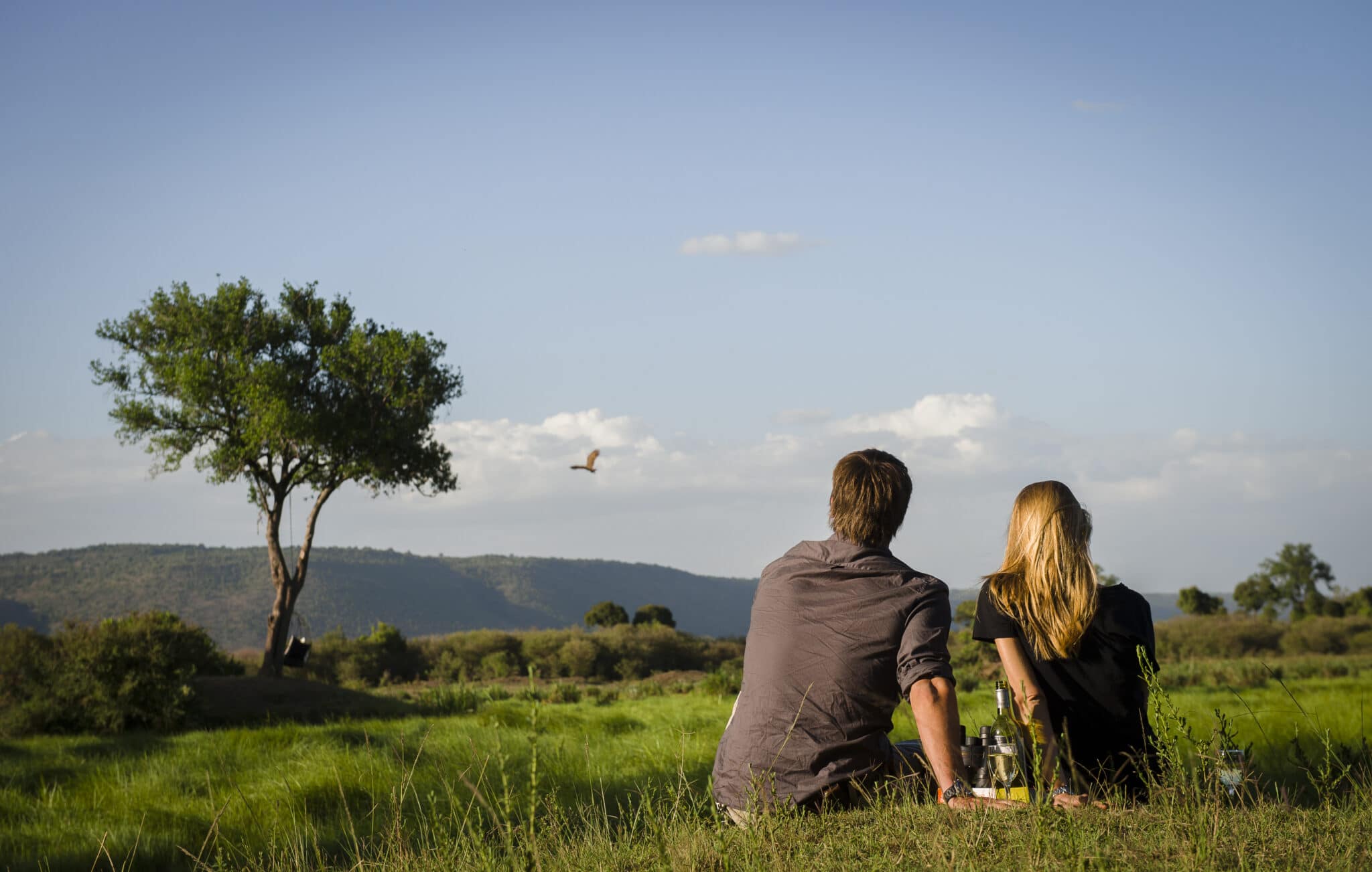 Romantic couple enjoying a luxury African honeymoon safari