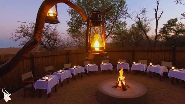 Romantic Candlelit Dinner During a Tanzania Honeymoon Safari