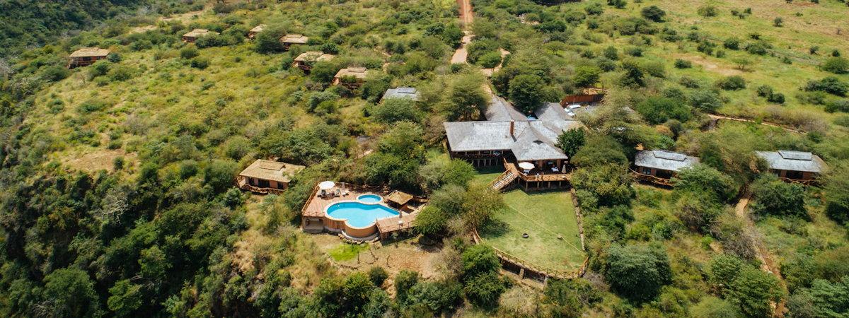 Perched along the Great Rift Valley escarpment, Escarpment Luxury Lodge offers 