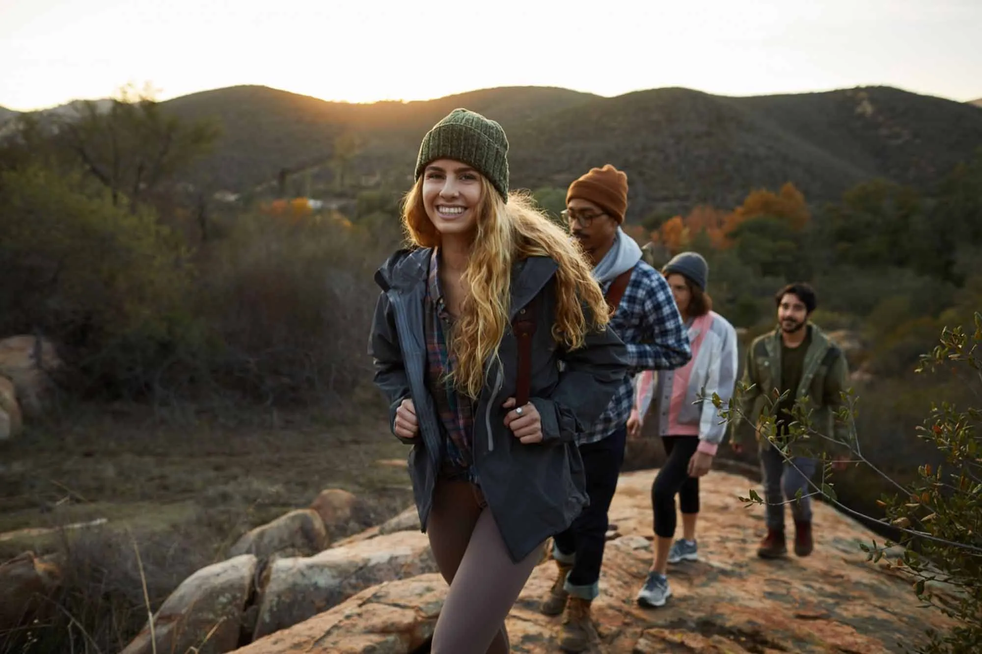 Couples planning gorilla trekking require several specialized items within their Honeymoon Safari Packing List. Waterproof hiking boots, gardening gloves, long trousers, long-sleeved shirts, rain jackets, and gaiters help protect against mud, insects, and dense vegetatio