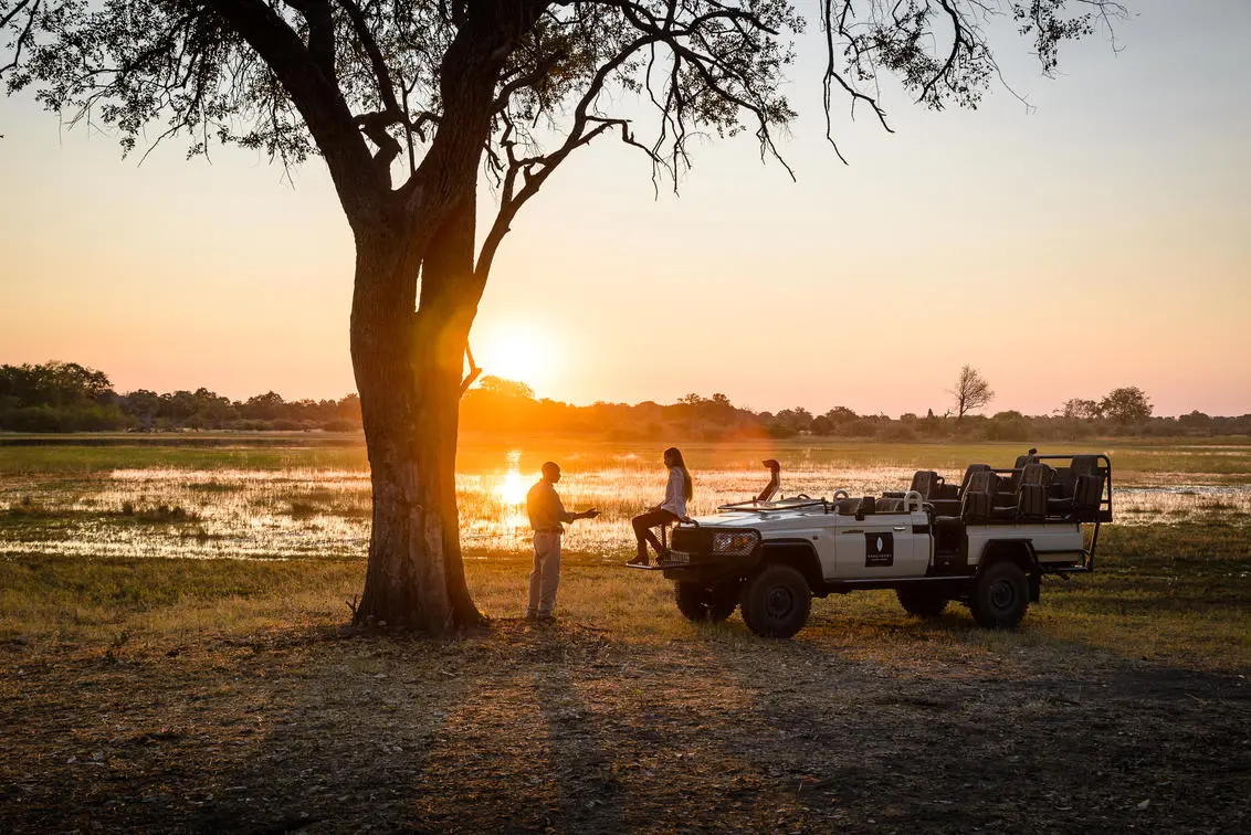 Couples Enjoying a Romantic Sundowner Safari in Tanzania